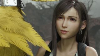 Tifa looks at a chocobo's yellow feathers