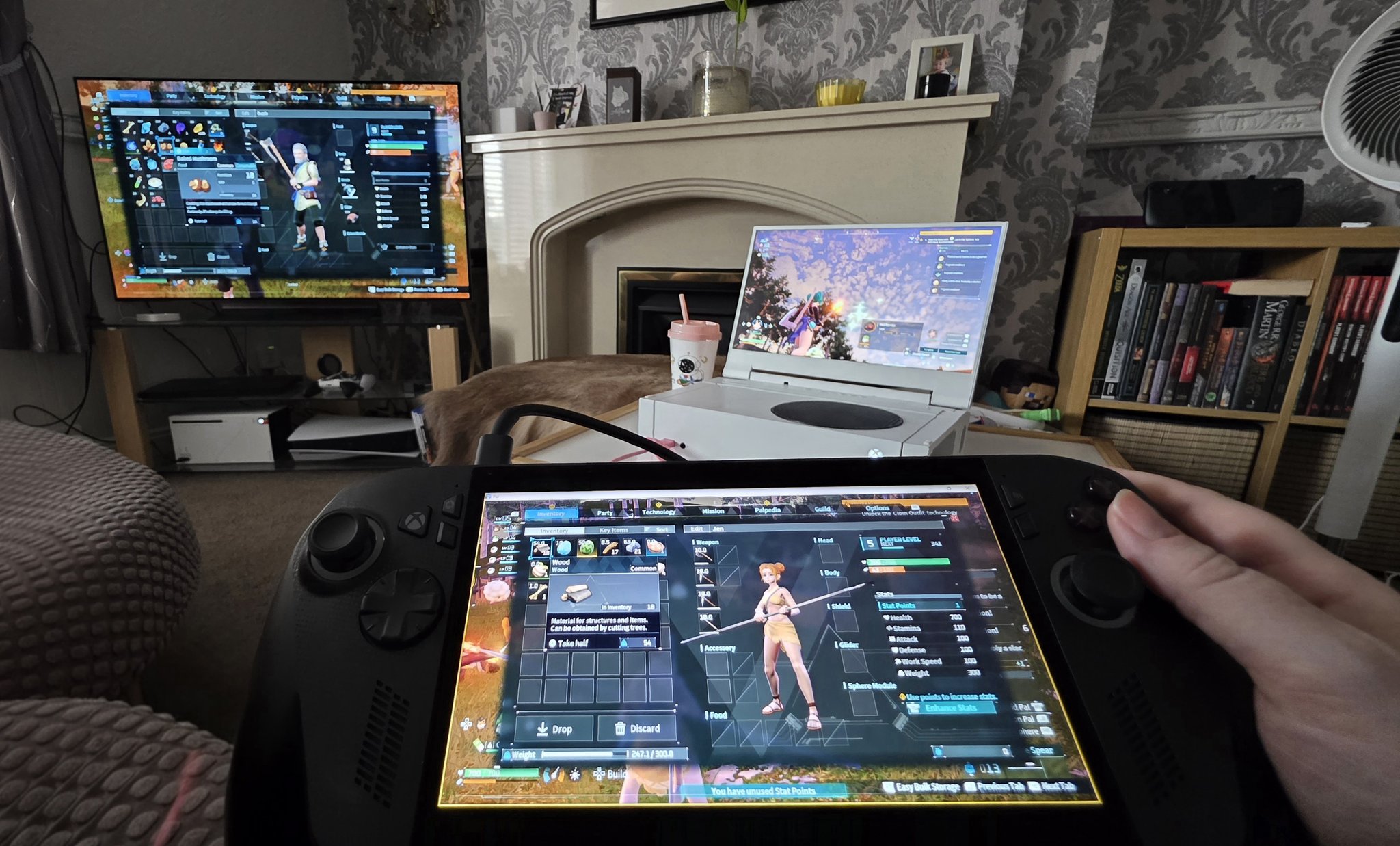 3 gaming consoles showing Palworld