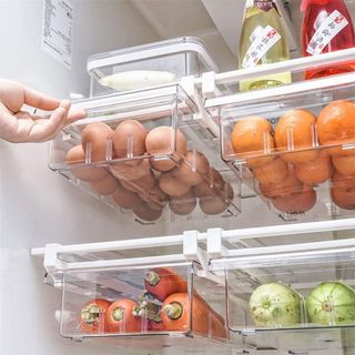 A plastic undershelf fridge drawer