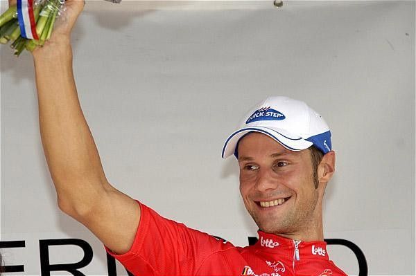 Tom Boonen (Quick Step) in the red jersey of the sprint classification leader.