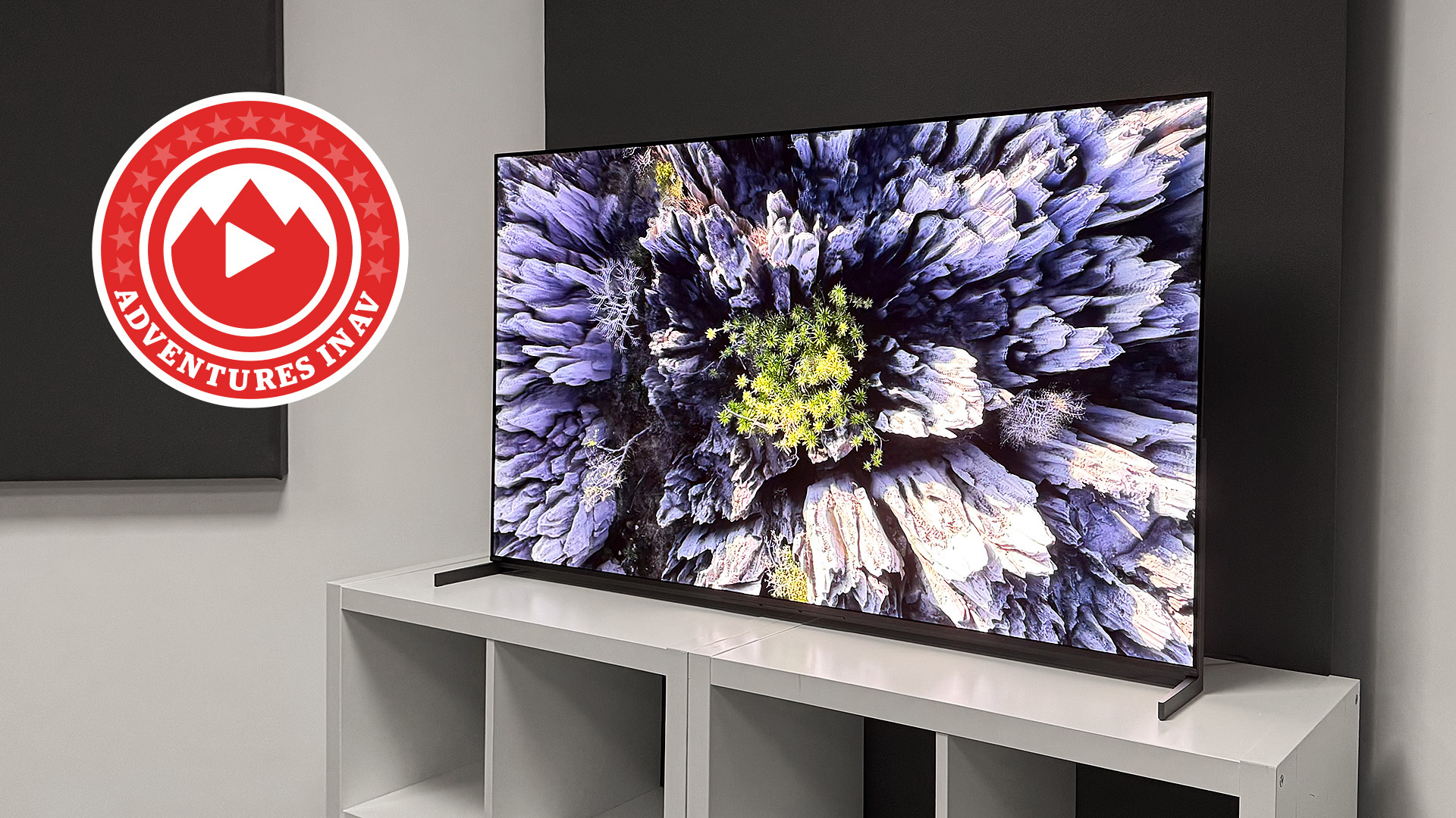 The Sony Bravia 8 II OLED TV, pictured on a white shelving unit