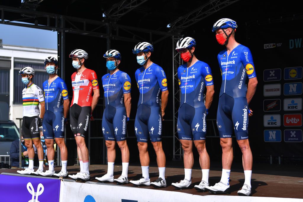 WAREGEM BELGIUM MARCH 31 Start Julian Alaphilippe of France Kasper Asgreen of Denmark Tim Declercq of Belgium Stijn Steels of Belgium Yves Lampaert of Belgium Davide Ballerini of Italy Florian Senechal of France and Team Deceuninck QuickStep during the 75th Dwars Door Vlaanderen 2021 Mens Elite a 1841km race from Roeselare to Waregem Mask Covid Safety Measures DDV DDV21 FlandersClassic A travers la Flandre on March 31 2021 in Waregem Belgium Photo by Luc ClaessenGetty Images