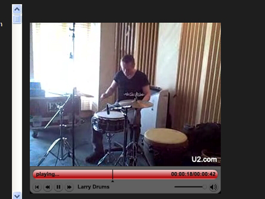 Larry Mullen on drums. Like, wow!