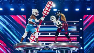 A Gladiator and contender battle it out in BBC One's Gladiators