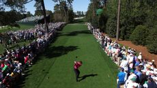 Tiger Woods hits a drive on the 18th hole at The Masters