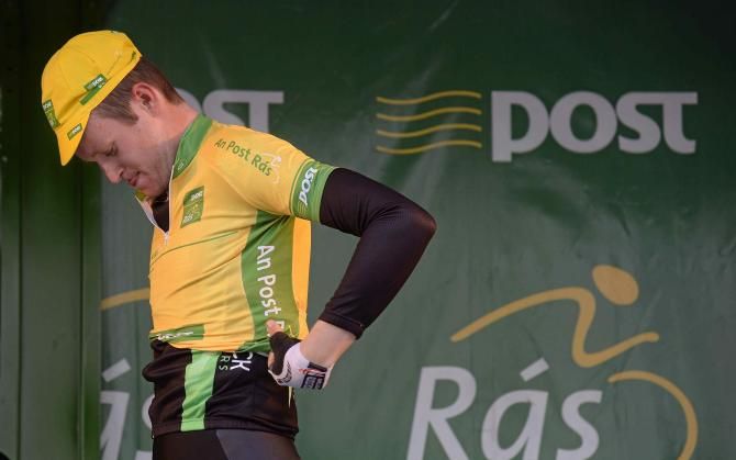 Conor Dunne pulls on the first race leader's jersey of the 2013 An Post Ras