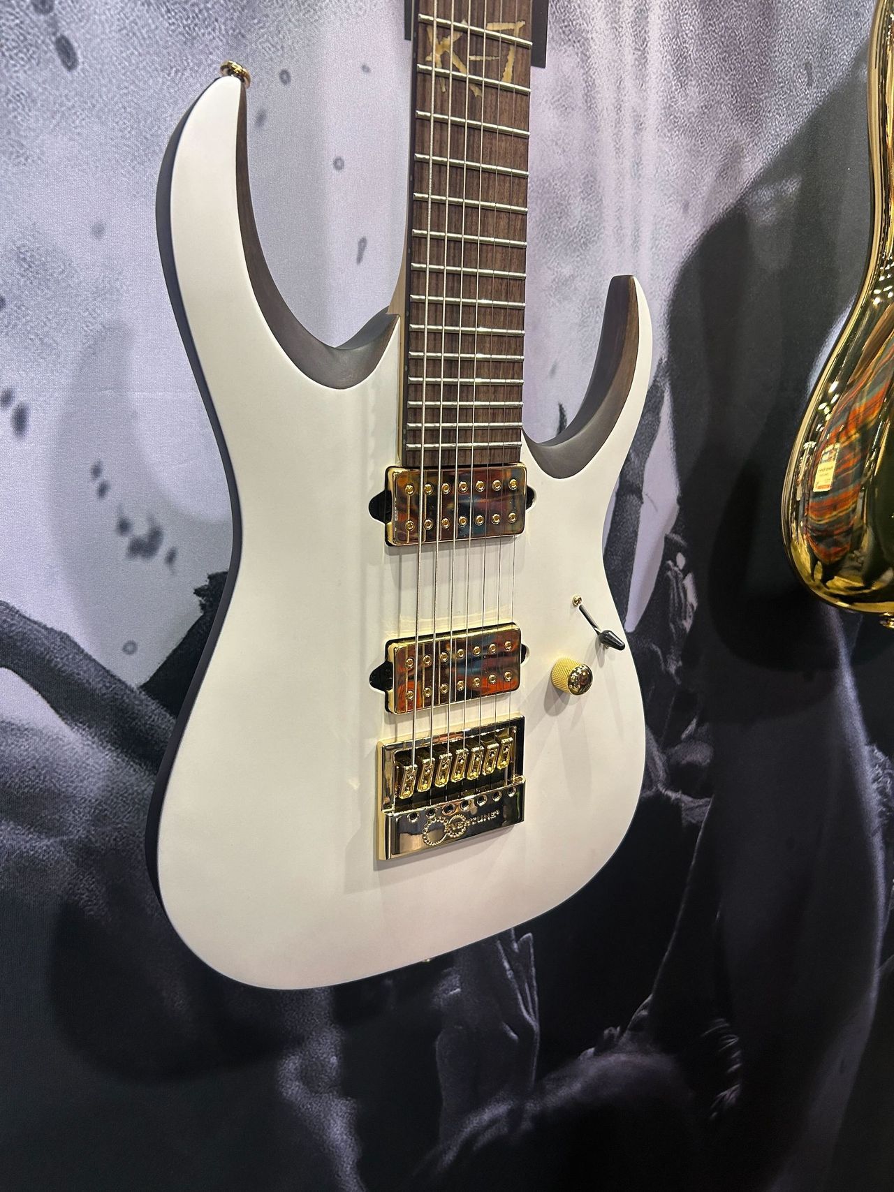 Seven of the guitars on display at Ibanez's booth at the 2025 NAMM Show in Anaheim, California
