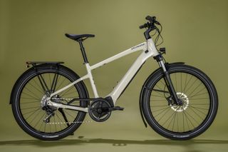 Specialized Turbo Vado 4.0 electric bike on an off yellow background
