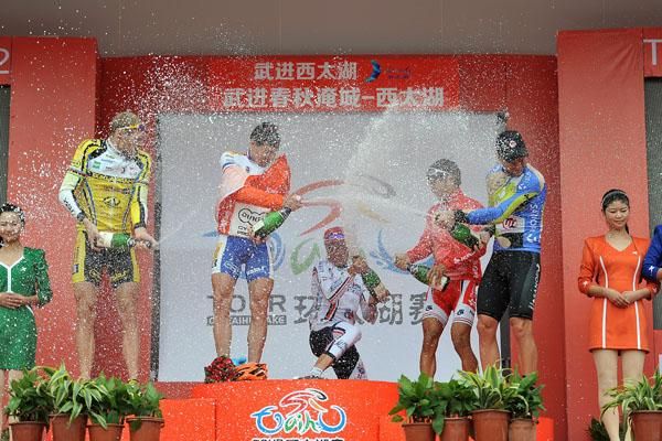 Champagne shenanigans on the podium