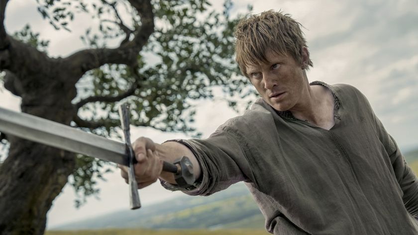 Outside, an unkempt-looking hedge knight Ser Duncan the Tall (Peter Claffey) brandishes his sword at something out of shot in a still for HBO series A Knight of the Seven Kingdoms.