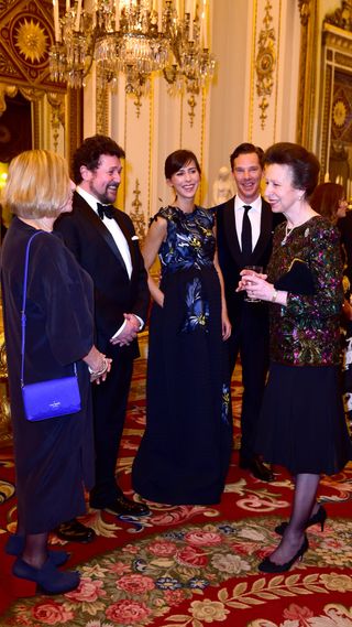Victoria Wood, Michael Ball, Sophie Hunter, Benedict Cumberbatch talk with Princess Anne, Princess Royal as they attend a reception and dinner in support of Motor Neurone Disease Association at Buckingham Palace on March 10, 2015 in London, United Kingdom.