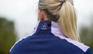 The back of the Proquip Darcey Ladies Rain Jacket