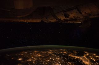 "The city lights of Europe illuminate the space station as we fly past," wrote NASA astronaut Kate Rubins of the 2016 photo on which the Expedition 64 patch was based.