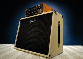 The amp head blends style with a tank-like construction