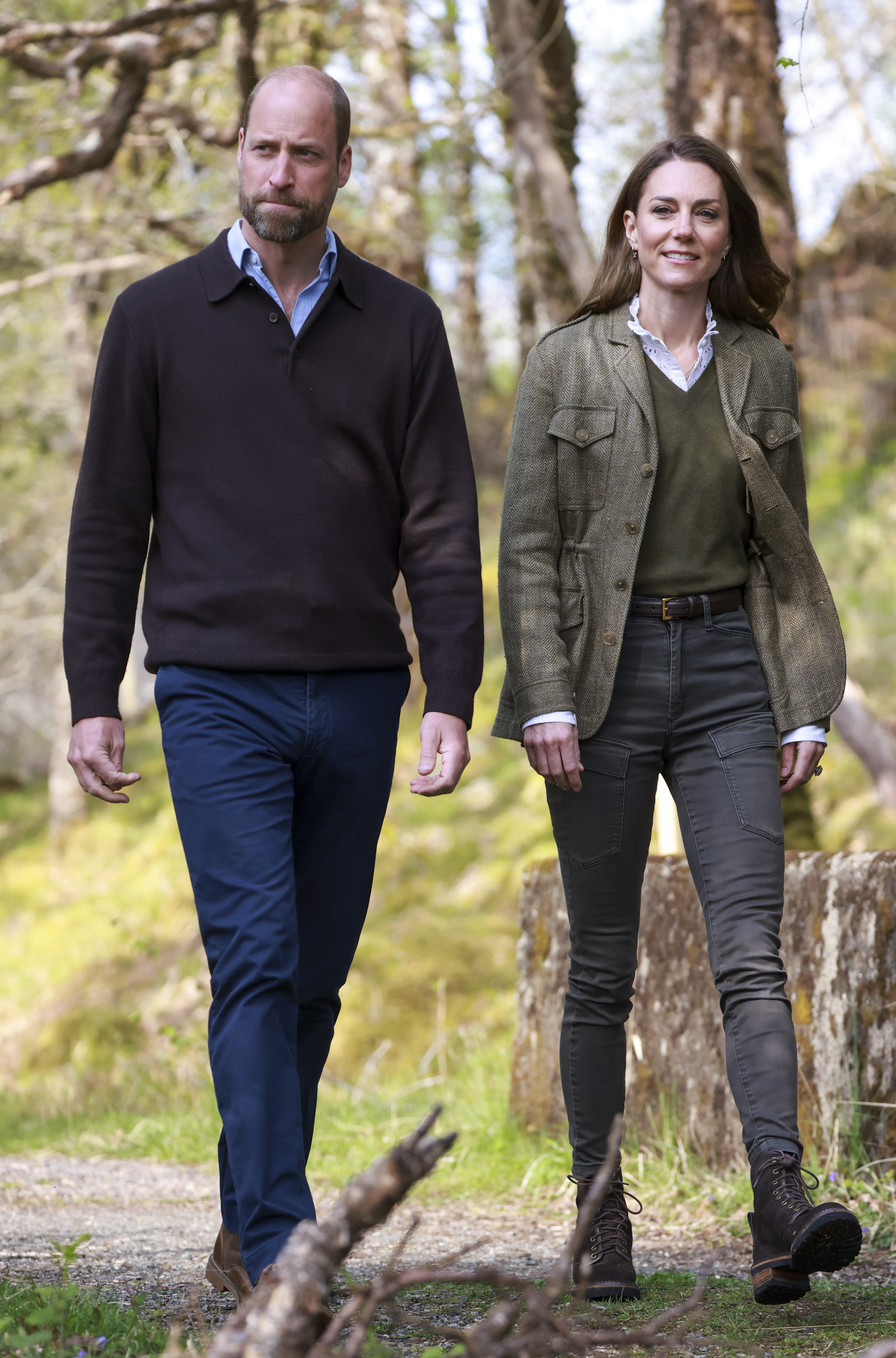 Prince William and Kate Middleton walking in the woods