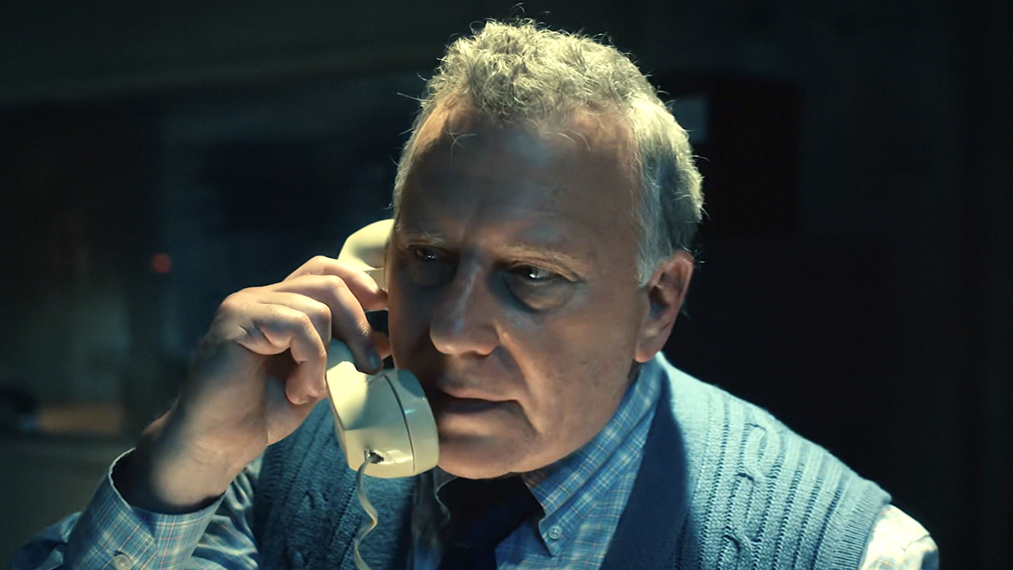 Dr. Owens talking on the phone in Stranger Things Season 4