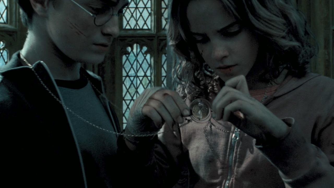 Hermione using the time-turner with Harry in Harry Potter and the Prisoner of Azkaban.