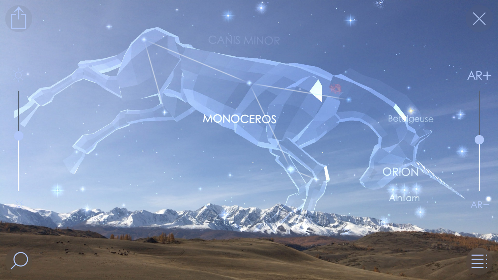 Screenshot from the Star Walk 2 app on iPad showing the constellation monoceros superimposed on an augmented reality background of mountains