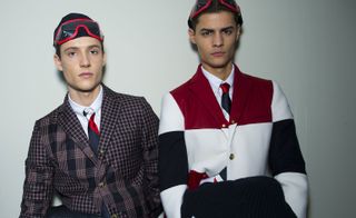 Two guys at fashion week wearing checked jackets