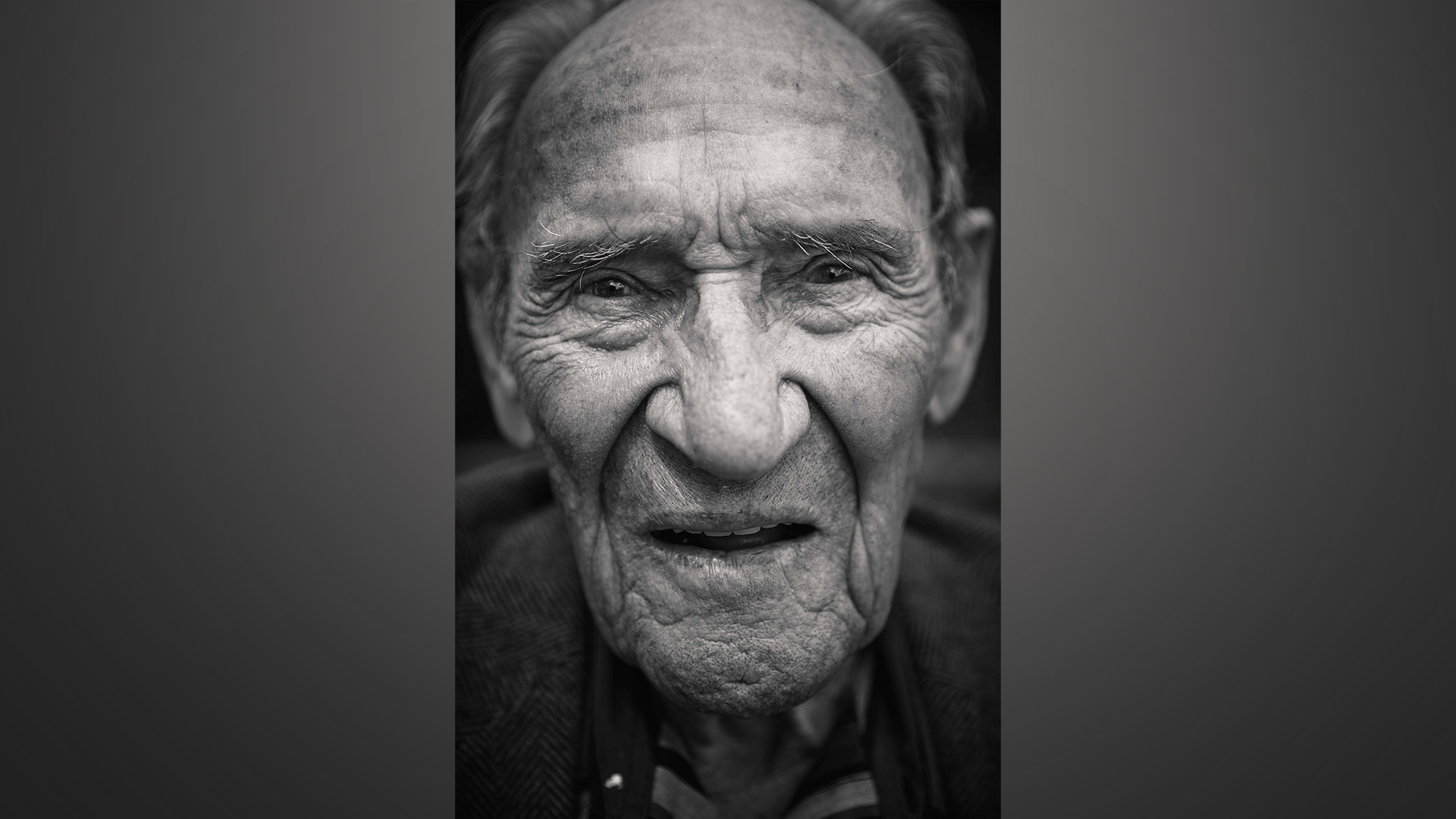 Portrait of old man cropped tightly.