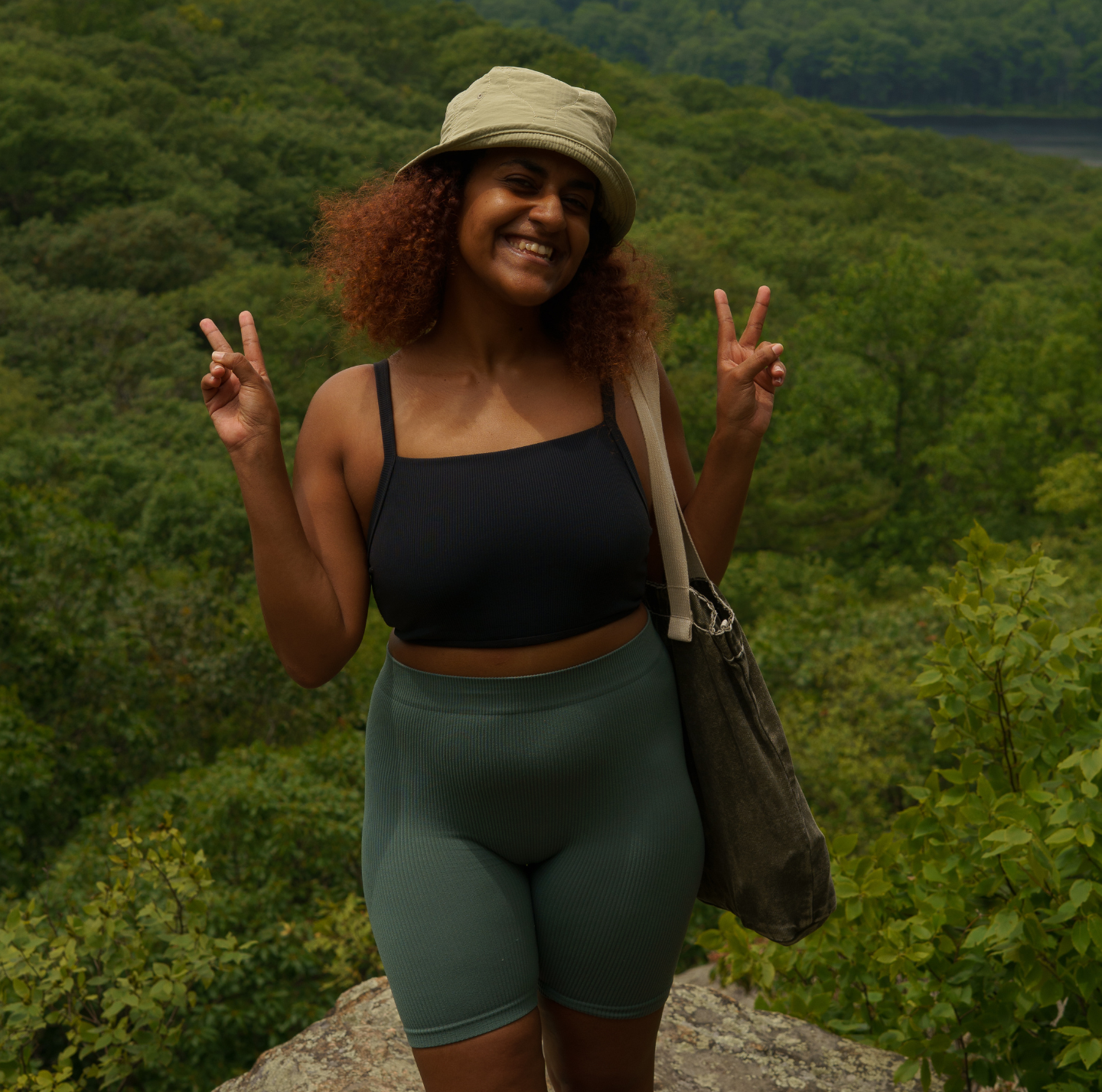 woman in hat hiking