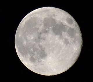 "Thinking of you, Neil," wrote Dennis Daniels, who took this blue moon photo to honor the late Neil Armstrong, who died Aug. 25, 2012 a week before this photo was taken.