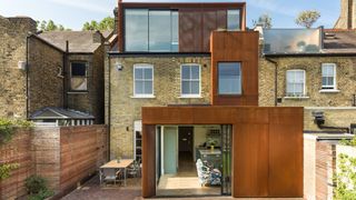 terrace house with corten clad extension