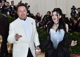 Elon Musk and musician Grimes show up as a couple to the 2018 Met Gala on May 7 at the Metropolitan Museum of Art in New York.