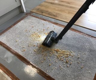 Samsung Bespoke Jet AI Vacuum vacuuming cereal