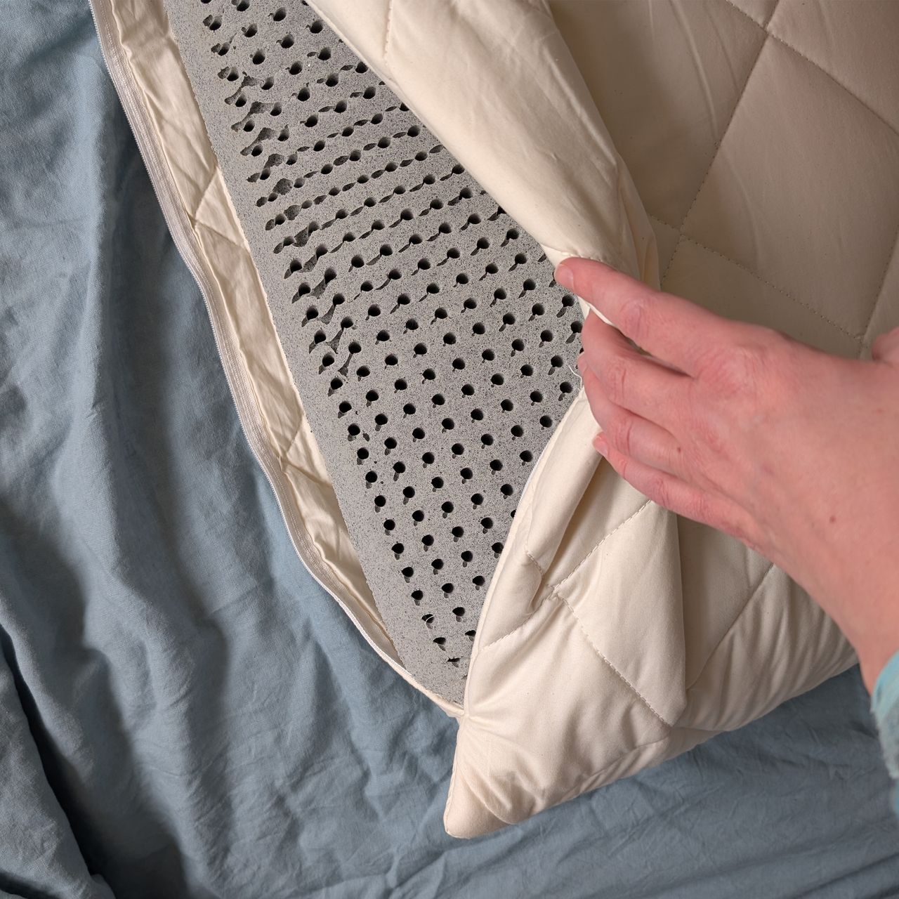 The Woolroom Natural Latex Washable Wool Pillow being tested