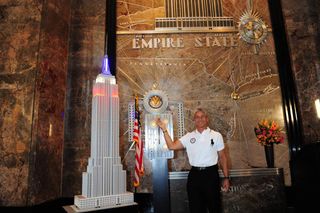 Greg Louganis, four-time gold medal winning diver (Los Angeles 1984, Seoul 1988) lights the Empire State Building red/white/blue to mark 100 days to the start of the London 2012 Olympic Games.