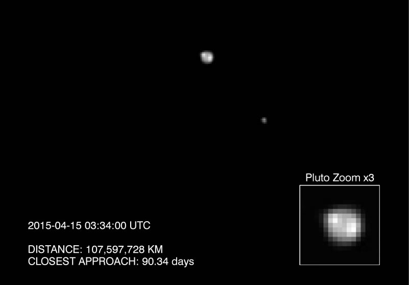 NASA&#039;s New Horizons spacecraft snapped this photo of Pluto (center) and its largest moon Charon on April 15, 2015 by the probe&#039;s Long Range Reconnaissance Imager. The image, which hints at surface features, is one of several views captured over several d