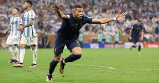 Kylian Mbappe of France celebrates after scoring the team's second goal during the FIFA World Cup Qatar 2022 Final match between Argentina and France at Lusail Stadium on December 18, 2022 in Lusail City, Qatar.