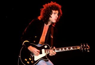 Neal Schon of Journey performs on stage at the Nassau Colliseum on October 10, 1981 in Uniondale, Long Island, New York