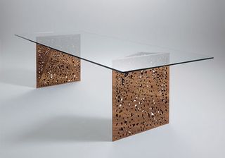 Architect Steven Holl and Nick Gelpi used laser cutting to create the table legs for this beautiful table design for online store HORM