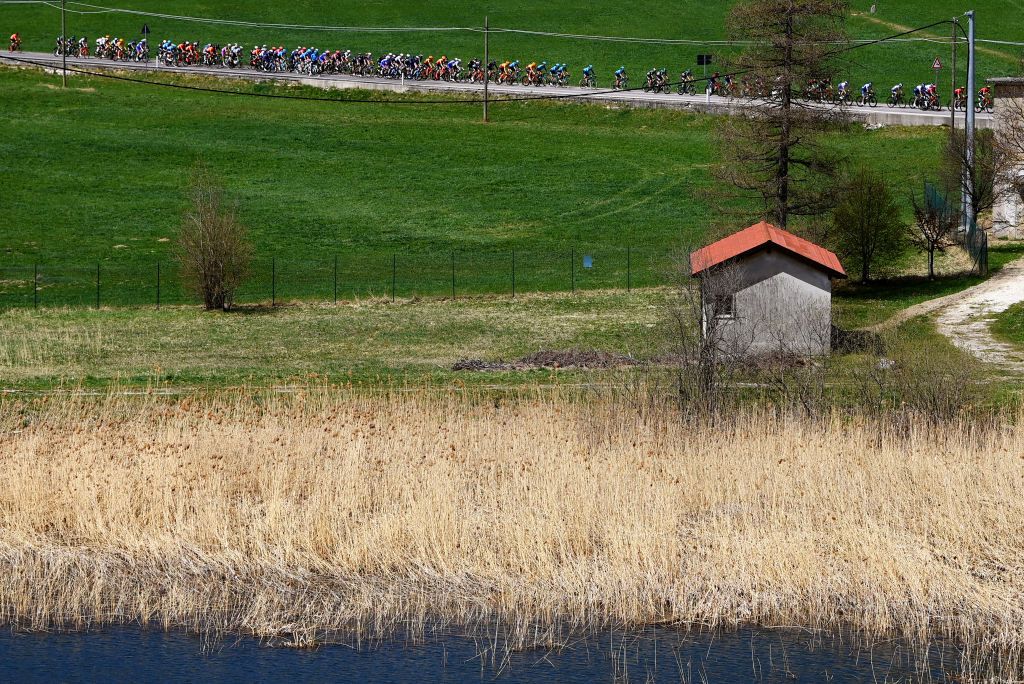 SAN MARTINO DI CASTROZZA ITALY APRIL 18 A general view of the peloton passing through a landscape during the 45th Tour of the Alps 2022 Stage 1 a 1609km stage from Cles to PrimieroS Martino di Castrozza 708m TouroftheAlps on April 18 2022 in San Martino di Castrozza Italy Photo by Tim de WaeleGetty Images