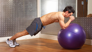 Gym ball incline plank