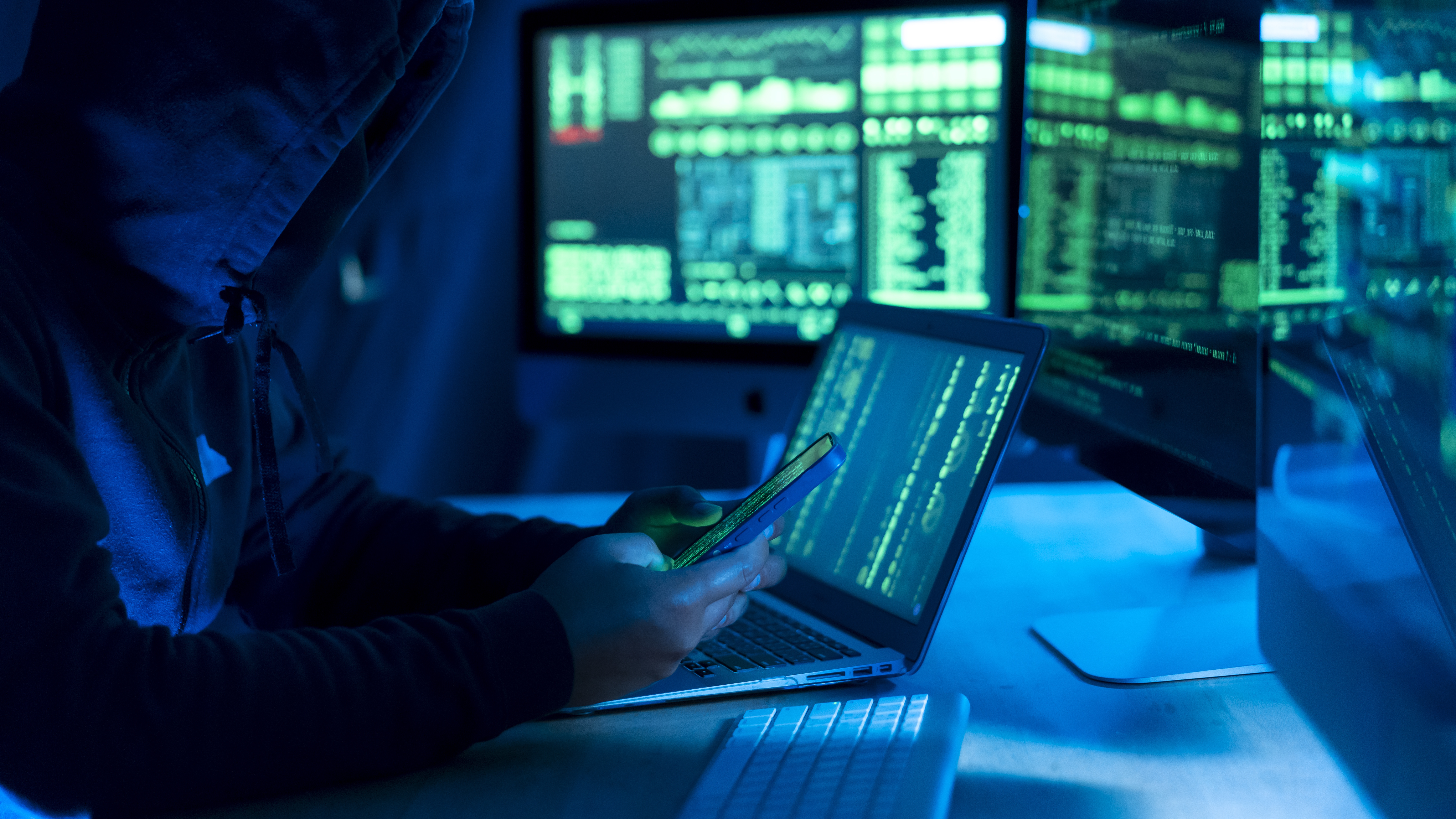 Hacker, IT and person with code on computer, programming and phishing scam with malware or virus.