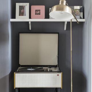 vintage turntables and frame on shelves