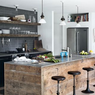 kitchen with white wall and crockery on shelf