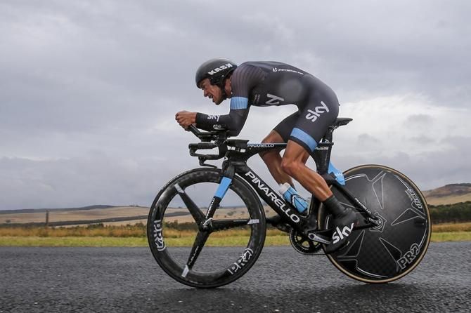 Richie Porte heads out under dark skies
