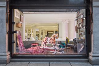 The Maker's studio window featuring the work of Darcey Fleming, Daisy Collingridge, Esna Su and a jeweller's workbench