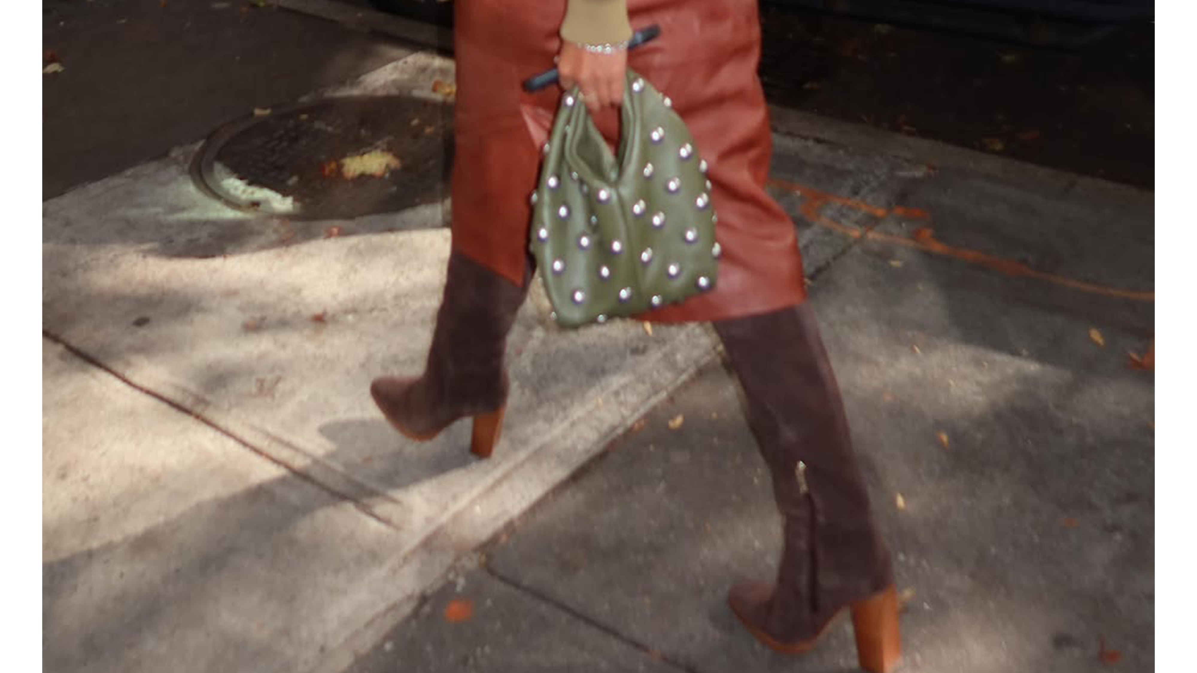 Sierra Mayhew wearing suede boots.