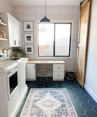 A kitchen with monochrome white and black wallpaper wallcovering, hexagonal floor tile decor exotic area rug