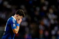 Greek forward Christos Tzolis sustains an injury during the UEFA Nations League match between Greece and the Netherlands at Toumba Stadium in Thessaloniki, Greece, on October 1, 2026.