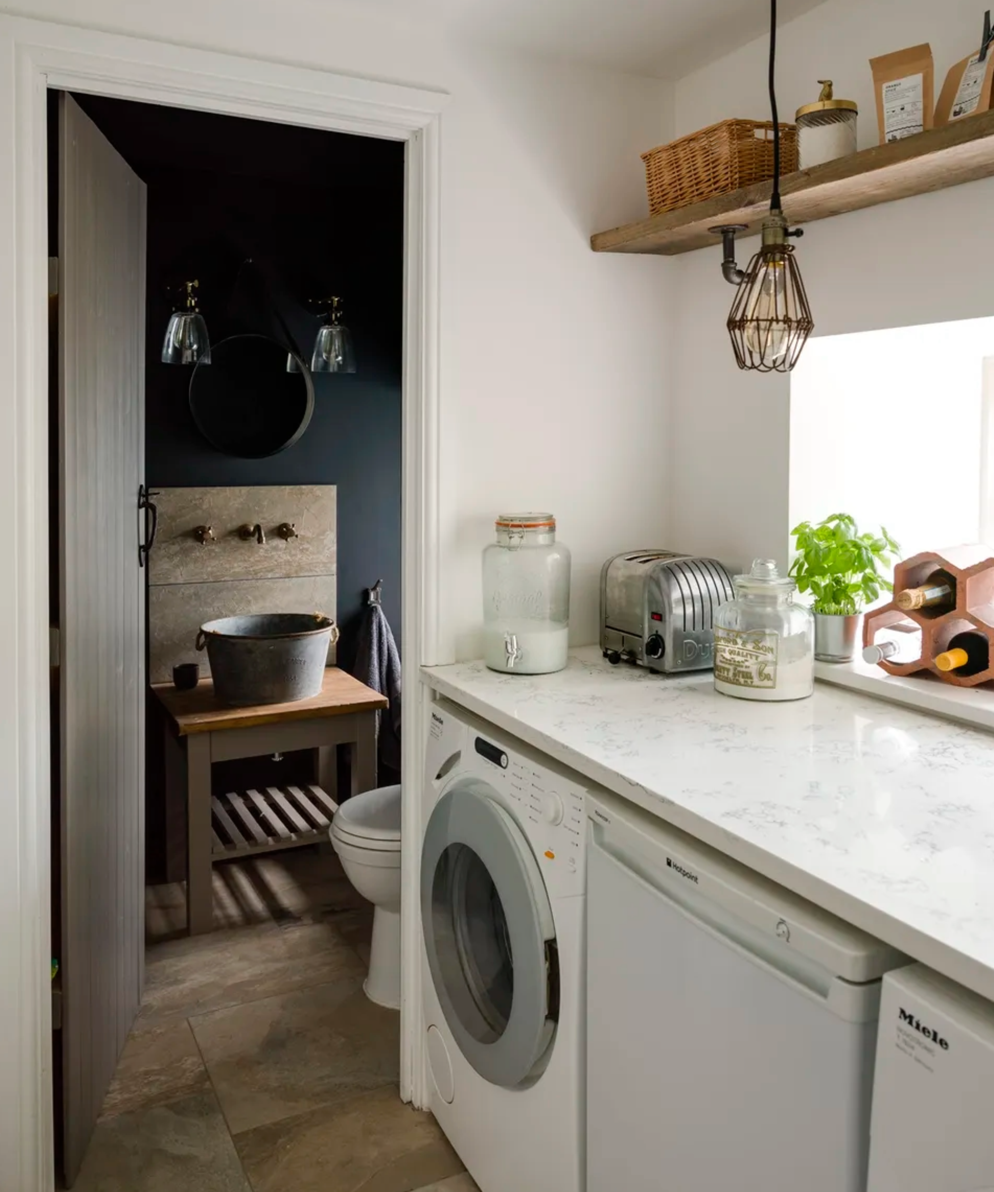 utility room with small downstairs bathroom
