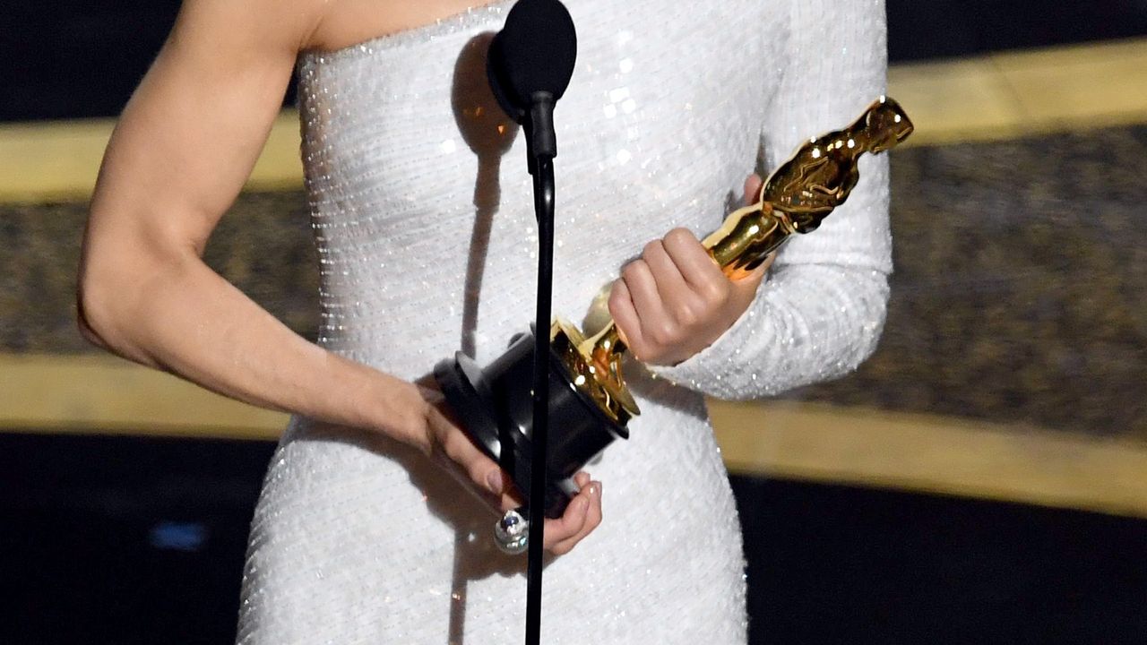 Renée Zellweger holds her Oscar statuette while accepting the Actress in a Leading Role award for &#039;Judy&#039; onstage during the 92nd Annual Academy Awards at Dolby Theatre on February 09, 2020