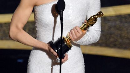 Renée Zellweger holds her Oscar statuette while accepting the Actress in a Leading Role award for 'Judy' onstage during the 92nd Annual Academy Awards at Dolby Theatre on February 09, 2020