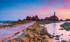 Remarkable engineering made ethereal: La Corbière lighthouse as the sun sets.