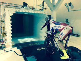 Simon Smart advises Alexander Kristoff on the best riding position during his wind tunnel test